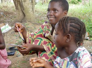 Ghanaian children learn from games.