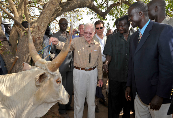 President Carter receives village gift.