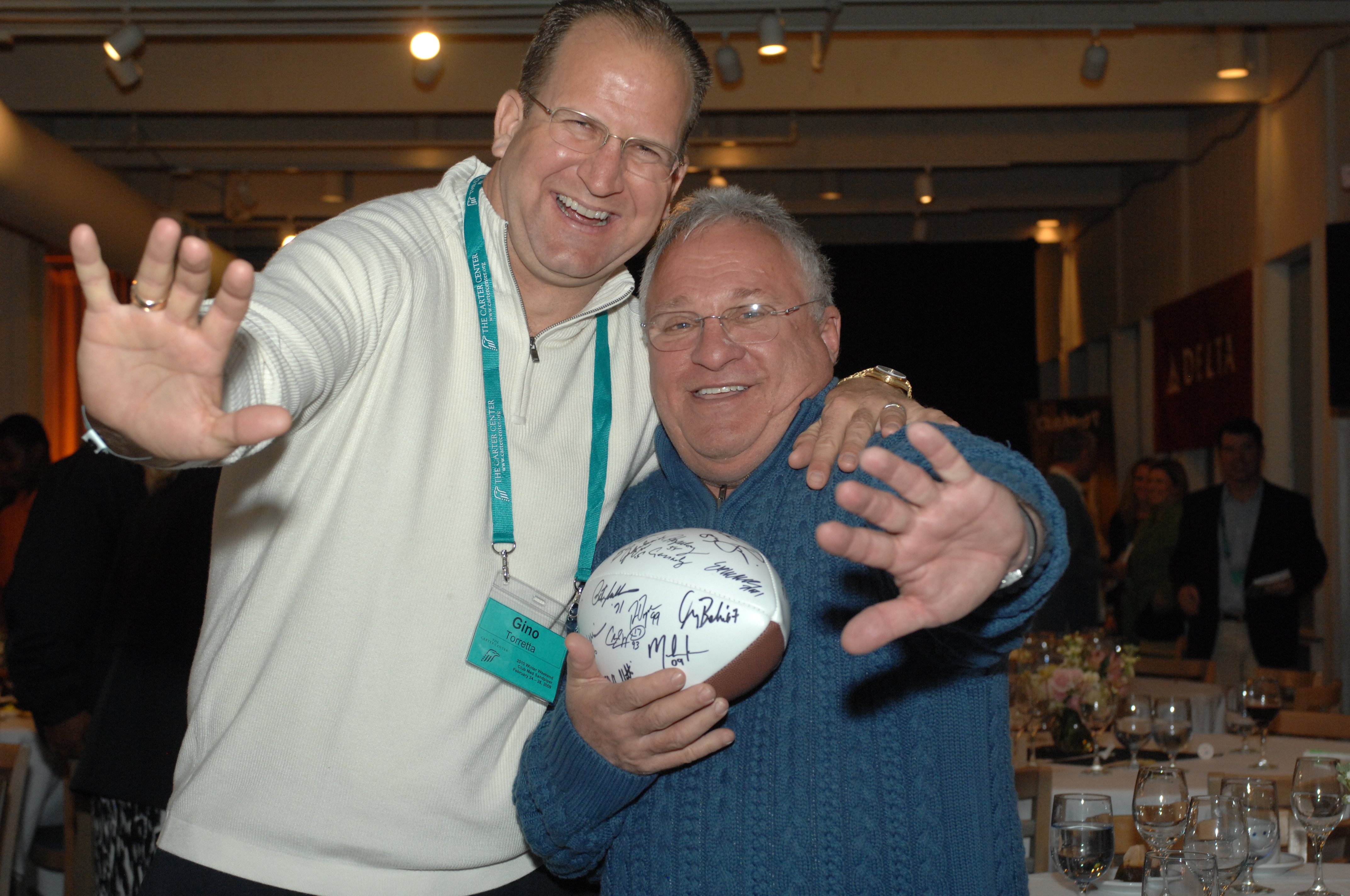 Gino Torretta and Gerry Rosenthal with Heisman Trophy football