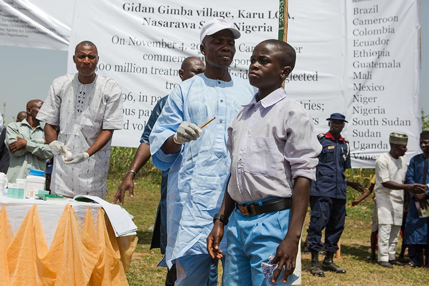 Jude Musa receives medicine in Nigeria.