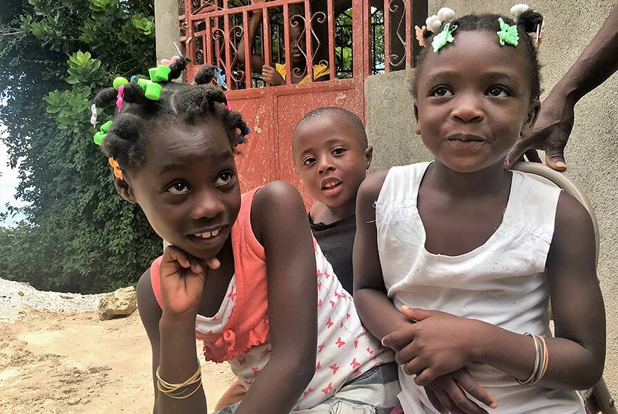 “I’m a brave girl!” declared Jessica (right), age 6, after calmly cooperating with getting her finger pricked for a blood test.