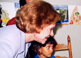 Former First Lady Mrs. Carter visits Abriendo Puertas, an Annie E. Casey Mental Health Initiative for Urban Children, Miami.