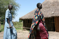 Visually impaired people arrive at the clinic for trachoma surgery screening.